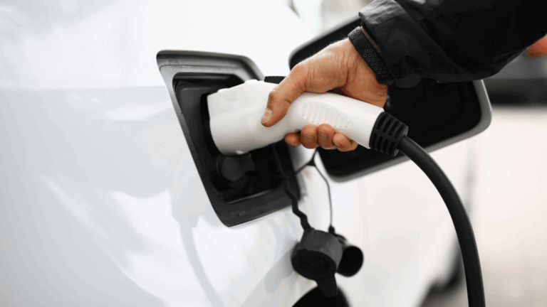 white tesla recharge in houston