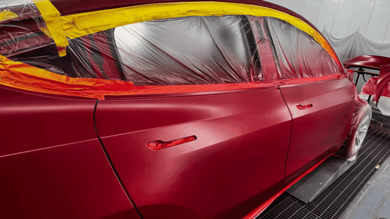 tesla vehicle being professionally painted in houston (1)