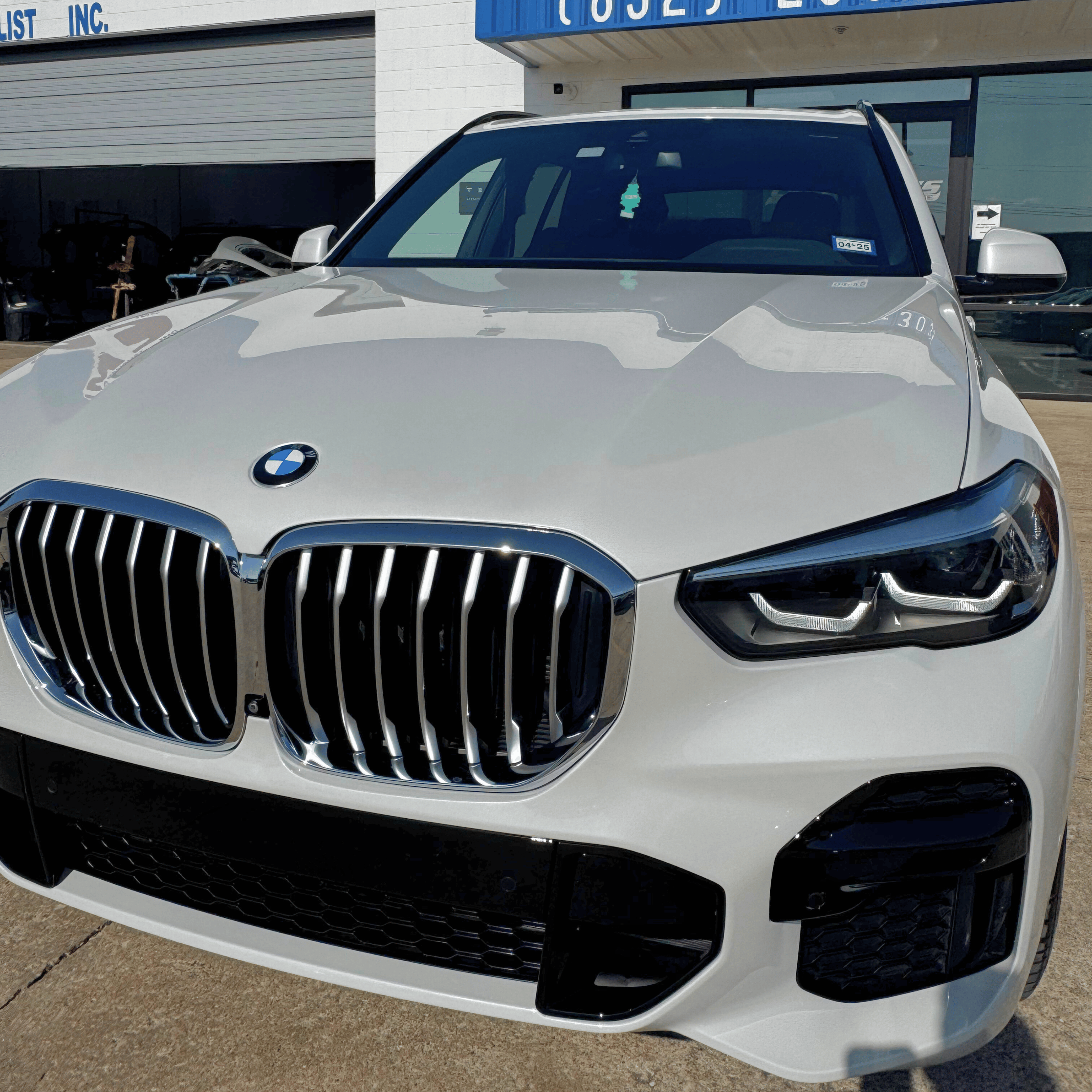 White BMW at Certified Collision Center Houston TX
